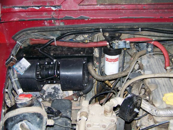 Complete installed heater without intake shrouding